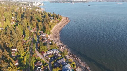Wall Mural - an aerial shot of luxury homes along the coastline of Proctor Avenue, West Vancouver with Vancouver City over the horizon.