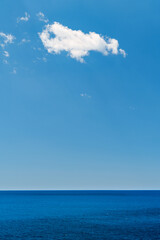 Wall Mural - beautiful blue background of sea and sky with white cloud