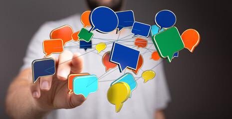 Man pointing to connected speech bubbles. Idea of communication network, social media interaction and global connection in digital technologies.