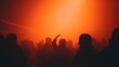 © Blurred Bokeh - Halloween party lounge blurred silhouettes of costumed figures dancing under neon orange strobes