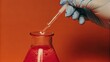 © Thanawat_Suesoypan - Laboratory experiment with pipette and colorful solution