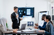 © PINA - team of multiethnic colleague discuss budget performance planning, sharing idea for cost reduction, business people man woman diverse employee coworker in formal suit meeting in finance office