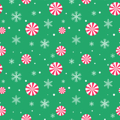 Wall Mural - Cute Christmas seamless pattern with candy and snowflakes in red and white isolated on green background.Merry Xmas vector graphic illustration wallpaper.