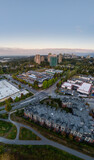 Aerial View Of New Westminster Suburban Cityscape With High Rise Buildings And Greenery