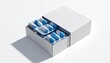 © jasjussegar - Modern medication concept featuring blue and white capsules in blister packs inside a minimalist box, conveying health, wellness, and pharmaceutical innovation