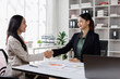 © David - Business handshake for teamwork of business merger and acquisition,successful negotiate,hand shake,two businessman shake hand with partner to celebration partnership and business deal concept