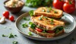 © Oleksandr - Two sandwiches with tomatoes spinach and cheese sit on plate. Bowl of couscous and tomatoes are in background. Sandwiches look delicious and nutricious ready to be served.