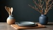 © Lubov - Minimalist dining setup on wooden board with blue plates, wooden cutlery, vases with dry branches on wooden table. Modern tableware and decor on dark background.