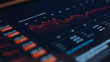 © Kenstocker - Stock market screen showing price drop graph.