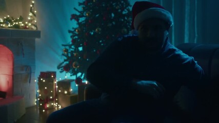 Wall Mural - Cold Man On Sofa Warms Up By The Fireplace On Christmas Eve Night Room