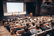 © kasto - Interview and round table discussion at business convention and presentation. Audience at the conference hall. Business and entrepreneurship symposium.