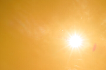 Wall Mural - bright sun in orange sky during hot summer weather. extremely high temperature