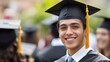 © sambath - A young man in a graduation cap and gown, smiling at the camera.