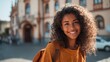 © LimeSky - City dwelling African American female college student smiles in a portrait Scholarships for studying abroad exchange programs and post graduation travel opportunities