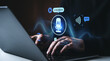 © ImageFlow - AI voice recognition and speech-to-text technology concept with glowing icons over laptop user interface in futuristic tech background scene..