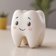 © Charisia - A cute, smiling tooth figurine, designed to promote dental health awareness, sits on a table with a soft background.