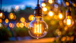 © hardvicore - Vintage Edison bulb with softly blurred evening background, cinematic bokeh, warm amber glow