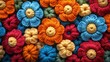 © Nikmah - Crochet flower pattern background, vibrant colors, close-up