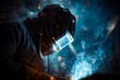 © Dina - Welder at his job, sparks flying in dark workshop, cinematic detail, wearing protective gear. Industry work safety concept. Manual labor profession market.