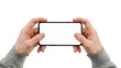 © PrismPNG - Male hands holding a smartphone horizontally with blank screen for mockup. Isolated on transparent background, png