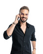 © Viorel Sima - handsome casual man with glasses speaking on the phone and smiling