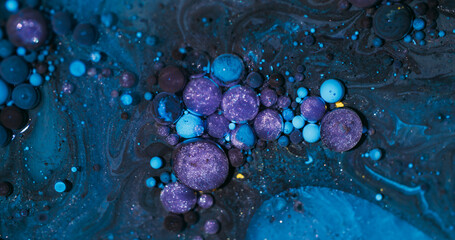 Wall Mural - Bubbles blend. Sparkling paint. Defocused purple blue yellow color glitter oil acrylic water round fluid circle on abstract background.