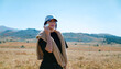 © boryanam - Beautiful Woman applying sunscreen spf stick in the autumn mountain