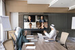 © fizkes - Arab business leaders hold online video conference with multiethnic workers