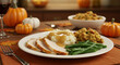 © Lily - A festive Thanksgiving dinner featuring turkey, mashed potatoes, stuffing, and green beans, with pumpkins.