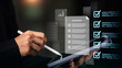 © chaylek - Digital document audit and checklist verification on tablet device. Concept of business management, compliance, and quality assurance for corporate process control and data accuracy improvement.