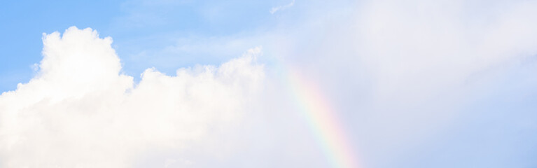 Wall Mural - nature and landscape concept with cloudy sky wit rainbow and moon in raining season