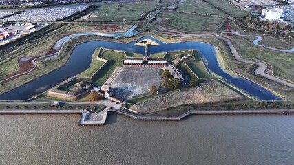 Wall Mural - Tilbury fort coastal star shaped fortress aerial view rising above the River Thames heritage site