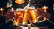 © MdNazim - Friends toasting with frothy beer mugs clinking celebration