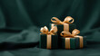 © Jirawatfoto - Luxurious and elegant stack of green gift box with gold ribbon bow. special present for holiday celebration, creating festive and celebratory mood