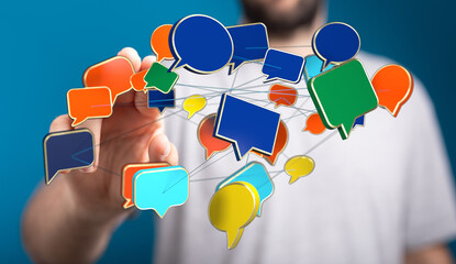 Conceptual image symbolizing communication, social media, and connected networks with vibrant speech bubbles in front of hand. Great for digital