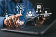 © Nirusmee - Onboarding new employee process concept. A person using a laptop with icons representing onboarding process, training, recruitment, communication, hiring, development, and employee integration.