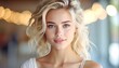 © Babang - A portrait featuring a woman with blonde, wavy hair, and captivating blue eyes. The background is softly blurred, suggesting an indoor setting with soft lighting