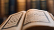 © twc - An open book with Arabic script reveals its sacred pages, knowledge and wisdom in every word, illuminated by soft light and the promise of insight.
