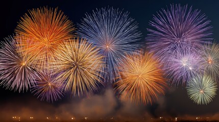 Wall Mural - Colorful Fireworks Exploding in the Night Sky During a Vibrant Celebration Event