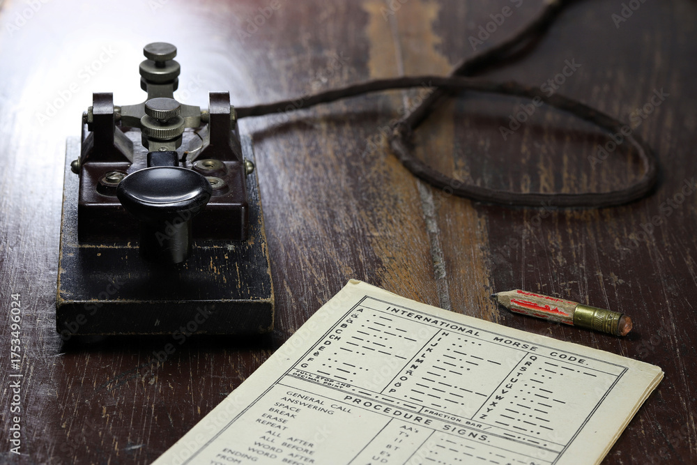 morse key with morse code chart on desk Stock Photo | Adobe Stock