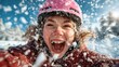 © JoxyAimages - A joyful girl exuberantly enjoying a snowy landscape, capturing the thrill and excitement of winter play as she revels in the beauty and fun of snow-filled activities.