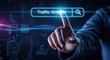 © Vodkaz - A person interacting with a digital search interface for traffic growth analysis.