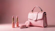 © Vadym - Pink handbag with lipstick and compact powder. Soft pastel makeup items and accessory arranged neatly. Chic feminine vanity table essentials for beauty.