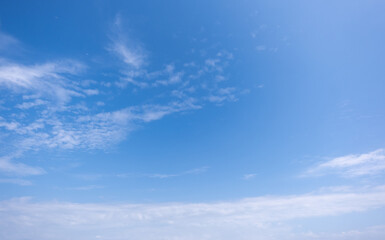 Wall Mural - clear blue sky background,clouds with background, Blue sky background with tiny clouds. White fluffy clouds in the blue sky. 