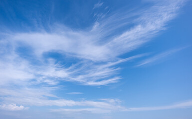 Wall Mural - clear blue sky background,clouds with background, Blue sky background with tiny clouds. White fluffy clouds in the blue sky. 