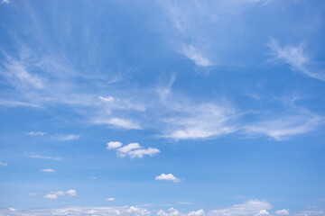 Wall Mural - clear blue sky background,clouds with background, Blue sky background with tiny clouds. White fluffy clouds in the blue sky. 