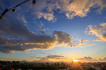 Wall Mural - The sky is a beautiful shade of blue with a few clouds scattered throughout