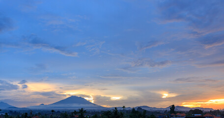 Wall Mural - The sky is clear and blue with a few clouds scattered throughout