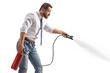 © Ljupco Smokovski - Businessman using a fire extinguisher