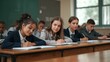 © Future Vision - Writing Asian teen student in uniform taking notes at classroom desk, with chalkboard, copy space